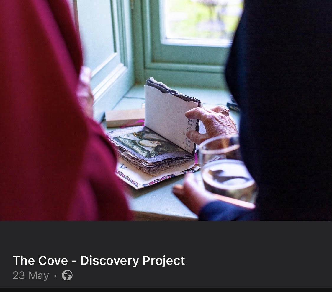 Visitor engaging with the artists' book